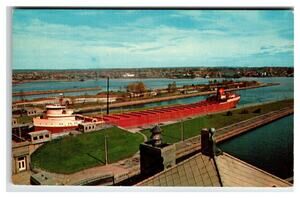 Sault Ste Marie MI Giant Ore Boat Entering Soo Locks Colorslide Postcard